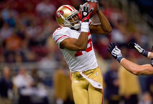 ST. LOUIS - JANUARY 3:  Michael Crabtree #15 of the San Francisco 49ers makes a catch during the game against the St. Louis Rams at the Edward Jones Dome on January 3, 2010 in St. Louis, Missouri.  The 49ers beat the Rams 28-6.  (Photo by Dilip Vishwanat/Getty Images)