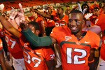 FORT LAUDERDALE, FL - SEPTEMBER 17:  Quarterback Jacory Harris #12 of the Miami Hurricanes celebrates after defeating the Georgia Tech Yellow Jackets at Land Shark Stadium on September 17, 2009 in Fort Lauderdale, Florida. Miami defeated Georgia Tech 33-17.  (Photo by Doug Benc/Getty Images)