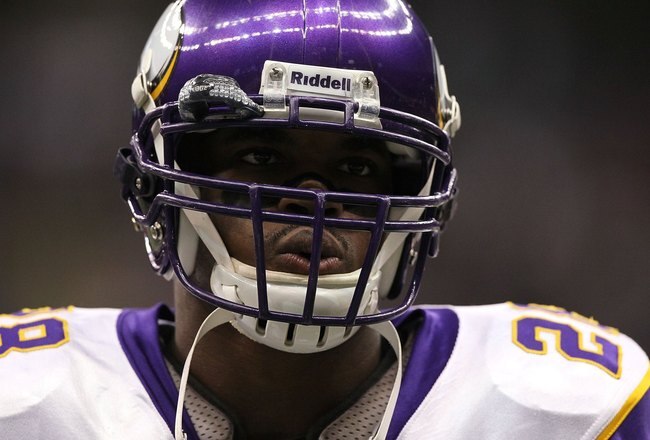 NEW ORLEANS - JANUARY 24:  Adrian Peterson #28 of the Minnesota Vikings looks on against the New Orleans Saints during the NFC Championship Game at the Louisiana Superdome on January 24, 2010 in New Orleans, Louisiana. The Saints won 31-28 in overtime. (Photo by Jed Jacobsohn/Getty Images)