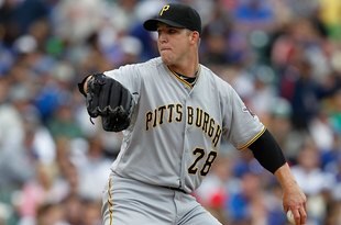 CHICAGO - MAY 15: Starting pitcher Paul Maholm #28 of the Pittsburgh Pirates delivers the ball against the Chicago Cubs at Wrigley Field on May 15, 2010 in Chicago, Illinois. The Pirates defeated the Cubs 4-3.  (Photo by Jonathan Daniel/Getty Images)