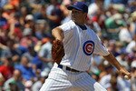 CHICAGO - JULY 16: Starting pitcher Ted Lilly #30 of the Chicago Cubs delivers the ball against the Philadelphia Phillies at Wrigley Field on July 16, 2010 in Chicago, Illinois. The Cubs defeated the Phillies 4-3. (Photo by Jonathan Daniel/Getty Images)