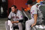PHOENIX - JULY 19:  Starting pitcher Mike Pelfrey #34 of the New York Mets reacts in the dugout after being removed from the Major League Baseball game against the Arizona Diamondbacks at Chase Field on July 19, 2010 in Phoenix, Arizona.  (Photo by Christian Petersen/Getty Images)
