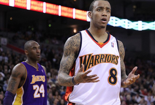 OAKLAND, CA - MARCH 15:  Monta Ellis #8 of the Golden State Warriors reacts to a call during action against the Los Angeles Lakers during an NBA game at Oracle Arena on March 15, 2010 in Oakland, California. NOTE TO USER: User expressly acknowledges and agrees that, by downloading and/or using this Photograph, user is consenting to the terms and conditions of the Getty Images License Agreement.  (Photo by Jed Jacobsohn/Getty Images)