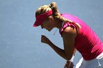 STANFORD, CA - JULY 31:  Victoria Azarenka of Belarus celebrates after winning a point against Samantha Stosur of Australia during the semifinals of the Bank of the West Classic at Stanford University on July 31, 2010 in Stanford, California. Azarenka defeated Stosur 6-2, 6-3.  (Photo by Jed Jacobsohn/Getty Images)
