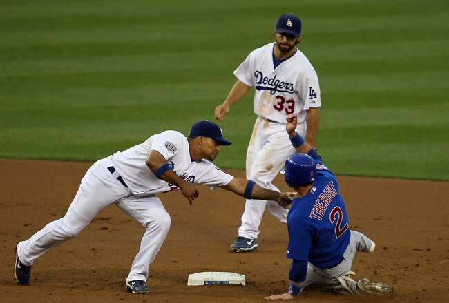 LOS ANGELES, CA - JULY 08:  Shortstop Rafael Furcal #15 of the Los Angeles Dodgers tags out Ryan Theriot #2 of the Chicago Cubs at second base after Theriot was picked off of first as second baseman Blake DeWitt #33 looks on in the fourth inning on July 8, 2010 at Dodger Stadium in Los Angeles, California.  (Photo by Stephen Dunn/Getty Images)
