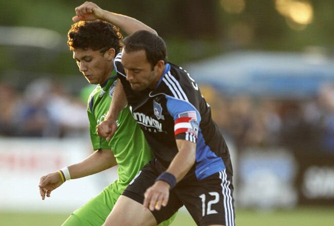 SANTA CLARA, CA - JULY 31:  Fredy Montero #17 of the Seattle Sounders FC and Ramiro Corrales #12 of the San Jose Earthquakes go for the ball at Buck Shaw Stadium on July 31, 2010 in Santa Clara, California.  (Photo by Ezra Shaw/Getty Images)