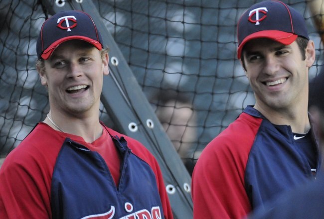 MINNEAPOLIS, MN - MAY 27: Justin Morneau #33 and Joe Mauer #7 of the Minnesota Twins during batting practice prior to the game against the New York Yankees on May 27, 2010 at Target Field in Minneapolis, Minnesota. The Twins defeated the Yankees 8-2. (Photo by Hannah Foslien/Getty Images)