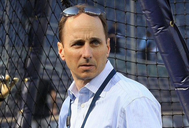 NEW YORK - APRIL 30:  General manager Brian Cashman of the New York Yankees looks on during batting practice prior to the game against the Chicago White Sox on April 30, 2010 at Yankee Stadium in the Bronx borough of New York City.  (Photo by Jim McIsaac/Getty Images)