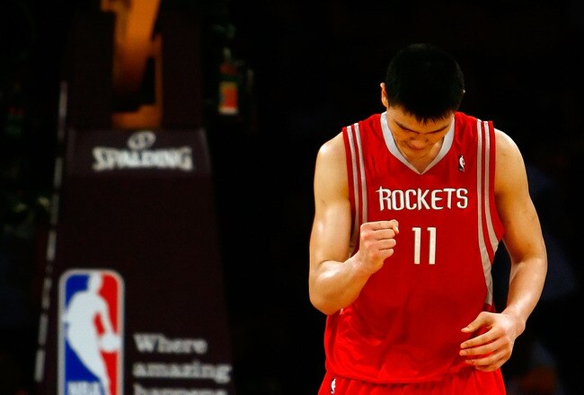 LOS ANGELES, CA - MAY 04:  Yao Ming #11 of the Houston Rockets reacts late in the fourth quarter against the Los Angeles Lakers in Game One of the Western Conference Semifinals during the 2009 NBA Playoffs at Staples Center on May 4, 2009 in Los Angeles, California. The Rockets defeated the Lakers 100-92. NOTE TO USER: User expressly acknowledges and agrees that, by downloading and or using this photograph, User is consenting to the terms and conditions of the Getty Images License Agreement.  (Photo by Jeff Gross/Getty Images)
