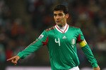 JOHANNESBURG, SOUTH AFRICA - JUNE 27: Rafael Marquez of Mexico in action during the 2010 FIFA World Cup South Africa Round of Sixteen match between Argentina and Mexico at Soccer City Stadium on June 27, 2010 in Johannesburg, South Africa.  (Photo by Richard Heathcote/Getty Images)