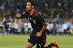 JOHANNESBURG, SOUTH AFRICA - JUNE 11:  Rafael Marquez of Mexico celebrates after scoring the second goal to equalise during the 2010 FIFA World Cup South Africa Group A match between South Africa and Mexico at Soccer City Stadium on June 11, 2010 in Johannesburg, South Africa.  (Photo by Michael Steele/Getty Images)