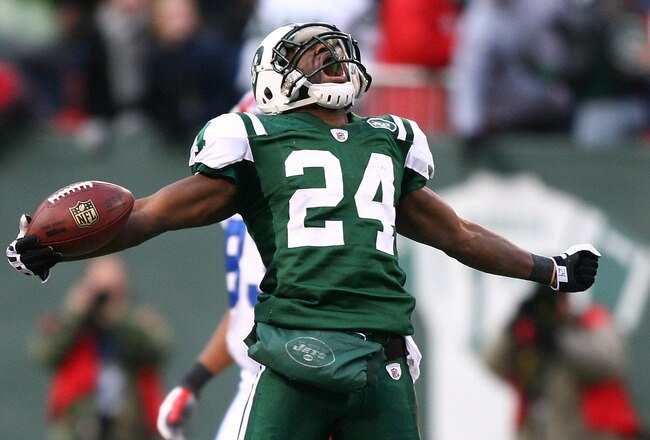 EAST RUTHERFORD, NJ - DECEMBER 14:  Darrelle Revis #24 of the New York Jets celebrates making a game saving interception in the closing minutes of regulation preserving a 31-27 win against the Buffalo Bills during their game on December 14, 2008 at Giants Stadium in East Rutherford, New Jersey.  (Photo by Al Bello/Getty Images)
