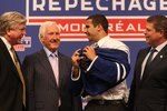 MONTREAL - JUNE 26:  (L-R)  Toronto Maple Leafs President & GM Brian Burke, Special Advisor Cliff Fletcher, First Round Draft Pick Nazem Kadri and Senior VP of Hockey Operations Dave Nonis stand on the stage during the first round of the 2009 NHL Entry Draft at the Bell Centre on June 26, 2009 in Montreal, Quebec, Canada. (Photo by Bruce Bennett/Getty Images)