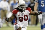 DETROIT - DECEMBER 20:  Darnell Dockett #90 of the Arizona Cardinals reacts after making a fourth down stop to take over on downs while playing the Detroit Lions on December 20, 2009 at Ford Field in Detroit, Michigan. Arizona won the game 31-24.  (Photo by Gregory Shamus/Getty Images)