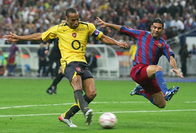 PARIS - MAY 17:  Thierry Henry of Arsenal misses a chance as Rafael Marquez of Barcelona challenges during the UEFA Champions League Final between Arsenal and Barcelona at the Stade de France on May 17, 2006 in Paris, France.  (Photo by Shaun Botterill/Getty Images)