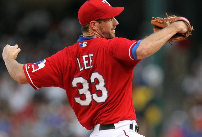 ARLINGTON, TX - JULY 22:  Pitcher Cliff Lee #33 of the Texas Rangers throws against the Los Angeles Angels of Anaheim on July 22, 2010 at Rangers Ballpark in Arlington, Texas.  (Photo by Ronald Martinez/Getty Images)