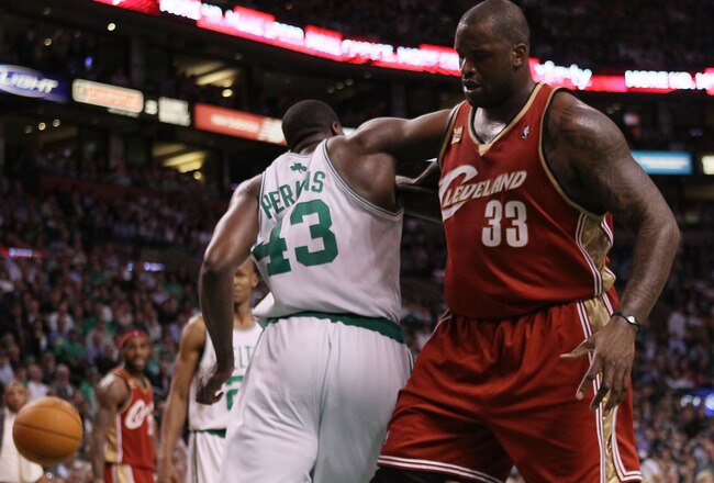 BOSTON - MAY 13:  Kendrick Perkins #43 of the Boston Celtics and Shaquille O'Neal #33 of the Cleveland Cavaliers fight for the ball during Game Six of the Eastern Conference Semifinals of the 2010 NBA playoffs at TD Garden on May 13, 2010 in Boston, Massachusetts. The Celtics defeated the Cavaliers 94-85.  NOTE TO USER: User Expressly Acknowledges and agrees that, by downloading and or using this photograph, User is consenting to the terms and conditions of the Getty Images License Agreement.  (Photo by Elsa/Getty Images)