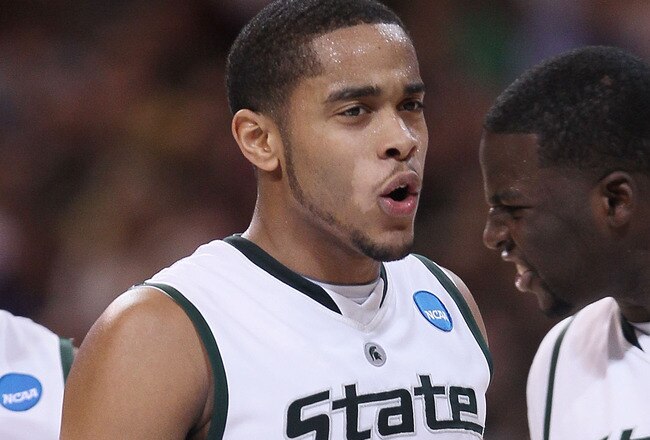 ST. LOUIS - MARCH 26:  Chris Allen #3 and Draymond Green #23 of the Michigan State Spartans celebrate in the second half against the Northern Iowa Panthers during the midwest regional semifinal of the 2010 NCAA men's basketball tournament at the Edward Jones Dome on March 26, 2010 in St. Louis, Missouri. Michigan State defeated Northern Iowa 59-52.  (Photo by Elsa/Getty Images)