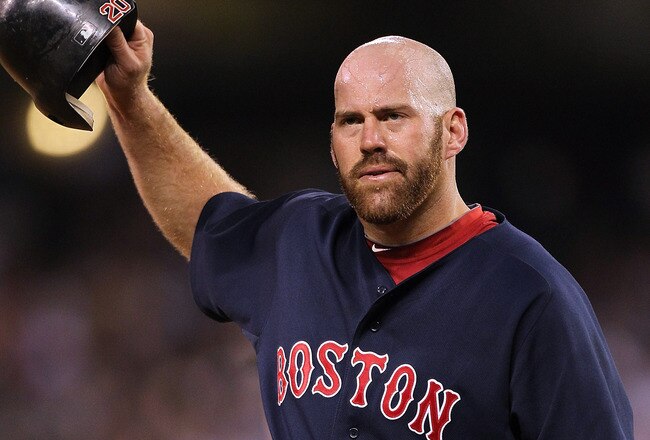 SEATTLE - JULY 24:  Kevin Youkilis #20 of the Boston Red Sox removes his helmet after the Red Sox were retired in the eighth inning with two runners on against the Seattle Mariners at Safeco Field on July 24, 2010 in Seattle, Washington. (Photo by Otto Greule Jr/Getty Images)
