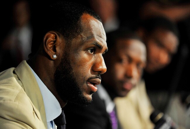 MIAMI - JULY 09:  LeBron James #6, (L) Dwyane Wade #3 (C) and Chris Bosh #1 of the Miami Heat talk during a press conference after a welcome party at American Airlines Arena on July 9, 2010 in Miami, Florida.  (Photo by Doug Benc/Getty Images)