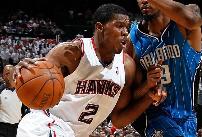 ATLANTA - MAY 10:  Joe Johnson #2 of the Atlanta Hawks against Rashard Lewis #9 of the Orlando Magic during Game Four of the Eastern Conference Semifinals of the 2010 NBA Playoffs at Philips Arena on May 10, 2010 in Atlanta, Georgia.  NOTE TO USER: User expressly acknowledges and agrees that, by downloading and/or using this Photograph, User is consenting to the terms and conditions of the Getty Images License Agreement.  (Photo by Kevin C. Cox/Getty Images)