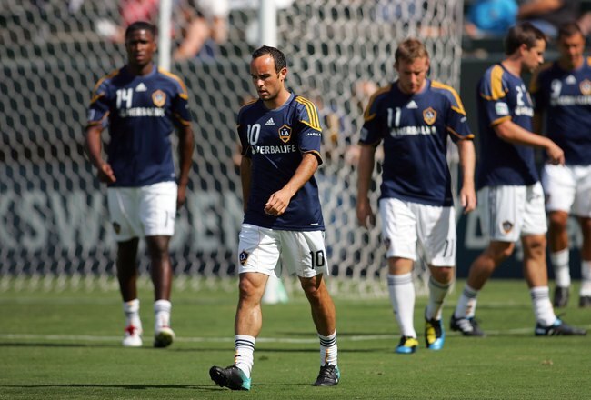 CARSON, CA - AUGUST 01:  Landon Donovan #10 of the Los Angeles Galaxy walks the pitch during warm up prior to their MLS match against the Chicago Fire at The Home Depot Center on August 1, 2010 in Carson, California. The Fire defeated the Galaxy 3-2.  (Photo by Victor Decolongon/Getty Images)
