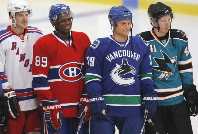 MISSISSAUGA, CANADA - AUGUST 26:  Bobby Sanguinetti #54 of the New York Rangers, P.K. Subban #89 of the Montreal Canadiens, Cody Hodgson #39 of the Vancouver Canucks and Logan Couture #41 of the San Jose Sharks pose during the Upper Deck NHL Rookie Debut on August 26, 2009 at the Hershey Centre in Mississauga, Ontario.  (Photo By Dave Sandford/Getty Images)