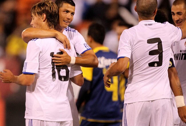 SAN FRANCISCO - AUGUST 04:  Sergio Canales #16 of Real Madrid celebrates with teammate Chirstiano Ronaldo #7 after scoring against Club America of Mexico during a pre-season game at Candlestick Park on August 4, 2010 in San Francisco, California.  (Photo by Jed Jacobsohn/Getty Images)
