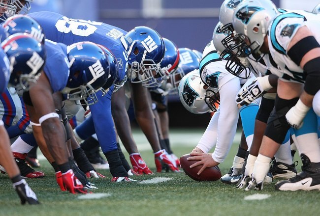 EAST RUTHERFORD, NJ - DECEMBER 27:  The New York Giants defense lines up against the Carolina Panthers offense at Giants Stadium on December 27, 2009 in East Rutherford, New Jersey.  (Photo by Nick Laham/Getty Images)