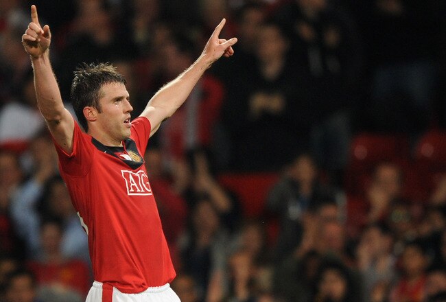 MANCHESTER, UNITED KINGDOM - SEPTEMBER 30:  Michael Carrick of Manchester United celebrates scoring his team's second goal during the UEFA Champions League Group B match between Manchester United and VfL Wolfsburg at Old Trafford on September 30, 2009 in Manchester, England. (Photo by Laurence Griffiths/Getty Images)