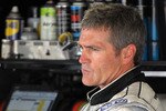 CONCORD, NC - MAY 29: Bobby Labonte, driver of the #71 TRG Motorsports Chevrolet, stands in the garage during practice for the NASCAR Sprint Cup Series Coca-Cola 600 at Charlotte Motor Speedway on May 29, 2010 in Concord, North Carolina.  (Photo by Drew Hallowell/Getty Images for NASCAR)