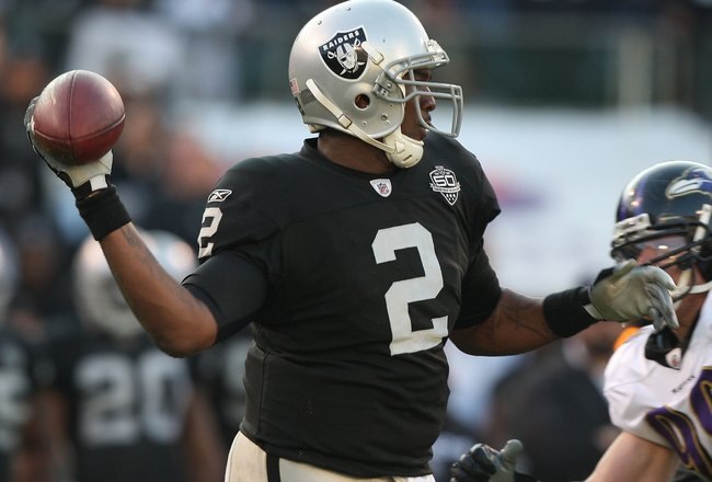 OAKLAND, CA - JANUARY 03:  JaMarcus Russell #2 of the Oakland Raiders in action  against the Baltimore Ravens during an NFL game at Oakland-Alameda County Coliseum on January 3, 2010 in Oakland, California.  (Photo by Jed Jacobsohn/Getty Images)