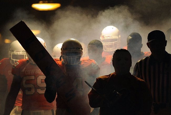 STILLWATER, OK - OCTOBER 31:  The Oklahoma State Cowboys make their way through the tunnel before taking on the Texas Longhorns at Boone Pickens Stadium on October 31, 2009 in Stillwater, Oklahoma.  (Photo by Ronald Martinez/Getty Images)