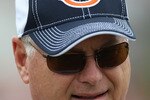 BOURBONNAIS, IL - JULY 30: Offensive coordinator Mike Martz of the Chicago Bears watches a summer training camp practice at Olivet Nazarene University on July 30, 2010 in Bourbonnais, Illinois. (Photo by Jonathan Daniel/Getty Images)