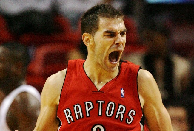 MIAMI - NOVEMBER 19:  Jose Calderon #8 of the Toronto Raptors celebrates after making a basket against the Miami Heat at American Airlines Arena on November 19, 2008 in Miami, Florida. The Raptors defeated the Heat 101-95. NOTE TO USER: User expressly acknowledges and agrees that, by downloading and/or using this Photograph, user is consenting to the terms and conditions of the Getty Images License Agreement.  (Photo by Doug Benc/Getty Images)