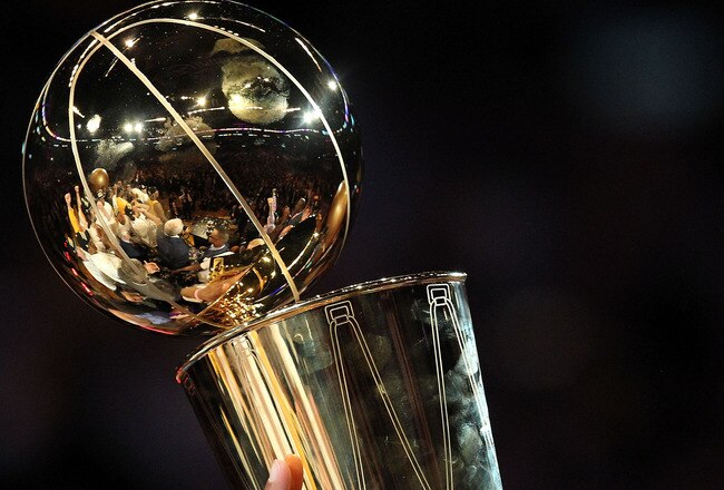 LOS ANGELES, CA - JUNE 17:  The Los Angeles Lakers hold up the Larry O'Brien Trophy after the Lakers defeated the Boston Celtics in Game Seven of the 2010 NBA Finals at Staples Center on June 17, 2010 in Los Angeles, California.  NOTE TO USER: User expressly acknowledges and agrees that, by downloading and/or using this Photograph, user is consenting to the terms and conditions of the Getty Images License Agreement.  (Photo by Ronald Martinez/Getty Images)