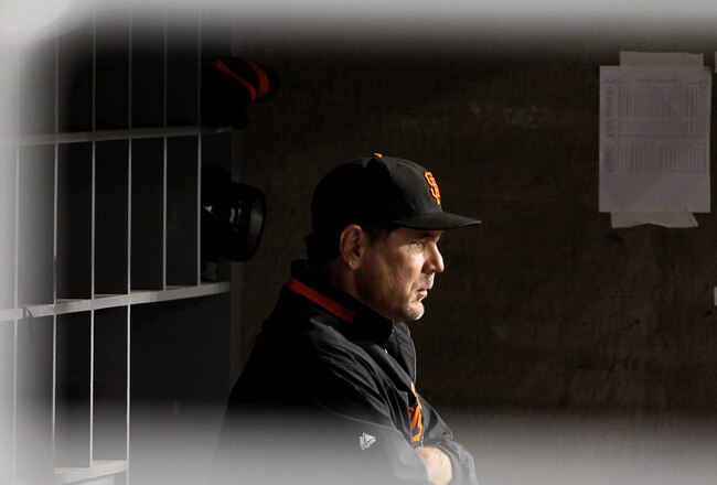 LOS ANGELES - JULY 19: Manager Bruce Bochy of the San Francisco Giants looks on from the dugout during the game with the Los Angeles Dodgers on July 19, 2010 at Dodger Stadium in Los Angeles, California.  The Giants won 5-2. (Photo by Stephen Dunn/Getty Images)