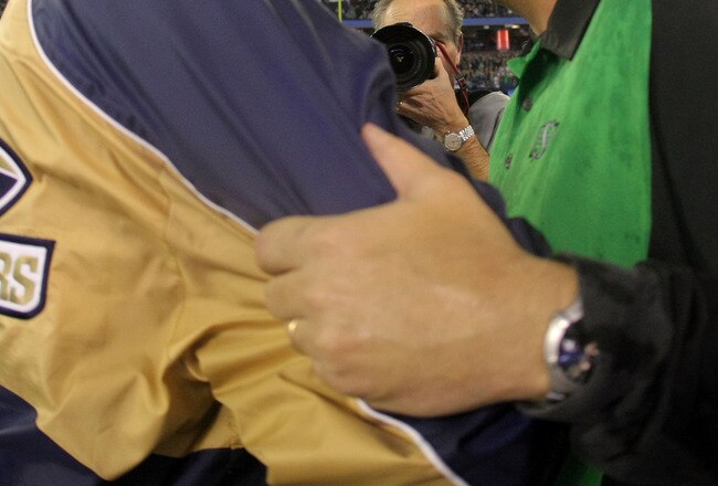 TORONTO, ON - NOVEMBER 25:  Head Coach Doug Berry of the Winnipeg Blue Bombers congratulates Head Coach  Kent Austin of the Saskatchewan Rough Riders for a 23-19 victory during the 95th Grey Cup on November 25, 2007 at the Rogers Centre in Toronto, Ontario, Canada.  (Photo by Harry How/Getty Images)
