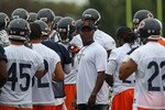 BOURBONNAIS, IL - JULY 30: Head coach Lovie Smith of the Chicago Bears prepares to talk to his team following a summer training camp practice at Olivet Nazarene University on July 30, 2010 in Bourbonnais, Illinois. (Photo by Jonathan Daniel/Getty Images)