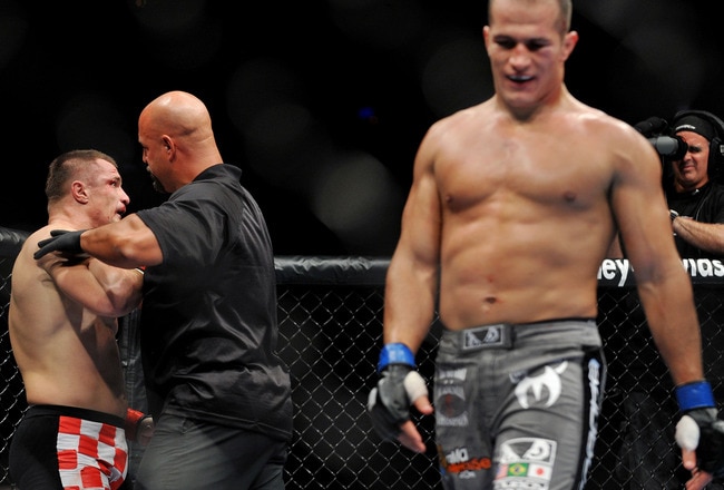 DALLAS - SEPTEMBER 19:  UFC fighter Mirko Cro Cop (L) is stopped by referee after losing to opponent UFC fighter Junior Dos Santo (R) during their Heavyweight bout at UFC 103: Franklin vs. Belfort at the American Airlines Center on September 19, 2009 in Dallas, Texas.  (Photo by Jon Kopaloff/Getty Images)