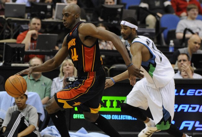 MINNEAPOLIS, MN - APRIL 7: Corey Brewer #22 of the Minnesota Timberwolves guards against Anthony Tolliver #44 of the Golden State Warriors in the second half of a basketball game at Target Center on April 7, 2010 in Minneapolis, Minnesota. The Warriors defeated the Timberwolves 116-107. NOTE TO USER: User expressly acknowledges and agrees that, by downloading and or using this Photograph, user is consenting to the terms and conditions of the Getty Images License Agreement.  (Photo by Hannah Foslien /Getty Images)