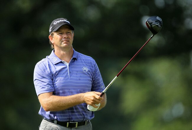 AKRON, OH - AUGUST 06:  Retief Goosen of South Africa watches his tee shot on the third hole during the second round of the World Golf Championships - Bridgestone Invitational on the South Course at Firestone Country Club on August 6, 2010 in Akron, Ohio.  (Photo by Andy Lyons/Getty Images)