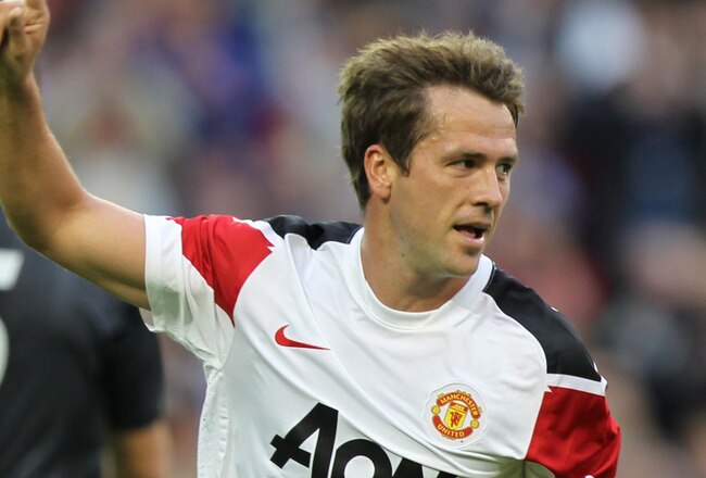 DUBLIN,  IRELAND AUGUST 4:  Michael Owen of Manchester United celebrates scoring the second goal during the Airtricity XI v Manchester United XI Friendly Match at the Aviva Stadium on August 4, 2010 in Dublin, Republic of Ireland. (Photo by Patrick Bolger/Getty Images)