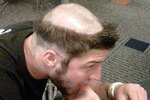 Tebowhaircut_crop_150x100