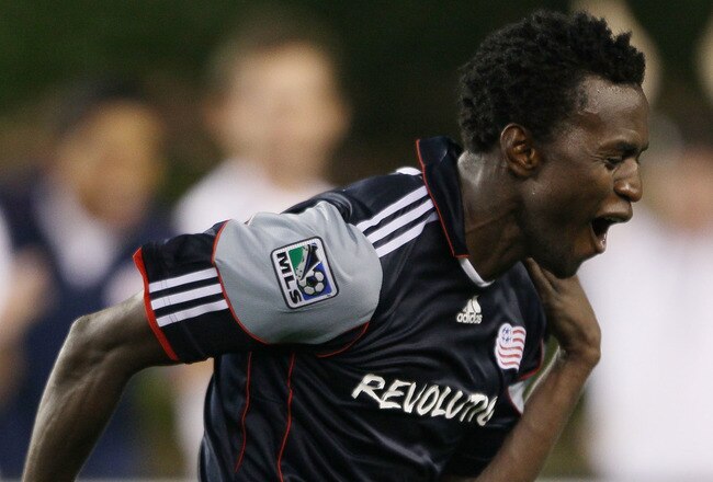 FOXBORO, MA - AUGUST 04:  Kenny Mansally #7 of the New England Revolution celebrates after he kicked the game winning goal in the overtime penalty kicks during the SuperLiga 2010 on August 4, 2010 at Gillette Stadium in Foxboro, Massachusetts. The Revolution defeated Pueblo FC 1-1(6-5 PK).  (Photo by Elsa/Getty Images)