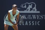 STANFORD, CA - AUGUST 01:  Maria Sharapova of Russia in action against Victoria Azarenka of Belarus during the finals of the Bank of the West Classic at Stanford University on August 1, 2010 in Stanford, California.  (Photo by Jed Jacobsohn/Getty Images)