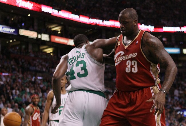 BOSTON - MAY 13:  Kendrick Perkins #43 of the Boston Celtics and Shaquille O'Neal #33 of the Cleveland Cavaliers fight for the ball during Game Six of the Eastern Conference Semifinals of the 2010 NBA playoffs at TD Garden on May 13, 2010 in Boston, Massachusetts. The Celtics defeated the Cavaliers 94-85.  NOTE TO USER: User Expressly Acknowledges and agrees that, by downloading and or using this photograph, User is consenting to the terms and conditions of the Getty Images License Agreement.  (Photo by Elsa/Getty Images)