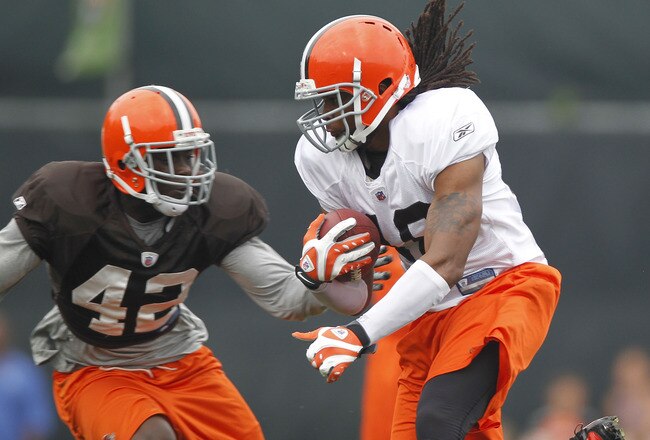 BEREA, OH - AUGUST 04:  Joshua Cribbs #16 of the Cleveland Browns tries to get around Larry Asante #42 during training camp at the Cleveland Browns Training and Administrative Complex on August 4, 2010 in Berea, Ohio.  (Photo by Gregory Shamus/Getty Images)
