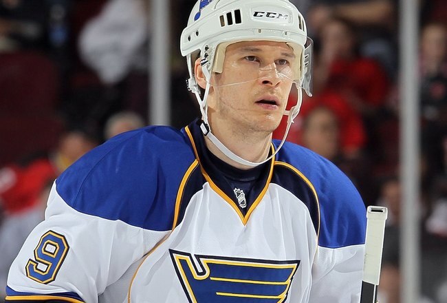 NEWARK, NJ - MARCH 20:  Paul Kariya #9 of the St. Louis Blues looks on against the New Jersey Devils at the Prudential Center on March 20, 2010 in Newark, New Jersey. The Blues defeated the Devils 1-0.  (Photo by Jim McIsaac/Getty Images)