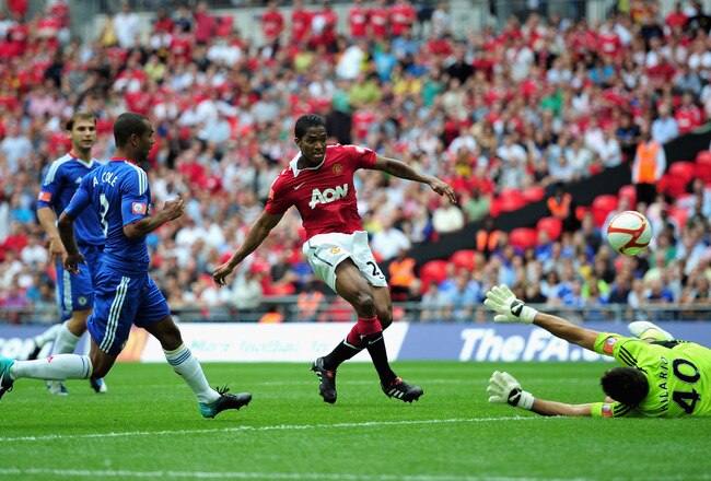 LONDON, ENGLAND - AUGUST 08:  Antonio Valencia of Manchester United (C) beats Henrique Hilario of Chelsea (40) to score their first goal during the FA Community Shield match between Chelsea and Manchester United at Wembley Stadium on August 8, 2010 in London, England.  (Photo by Shaun Botterill/Getty Images)